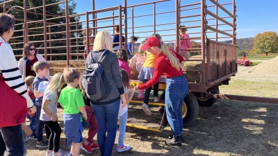 school loading on a hay wagon
